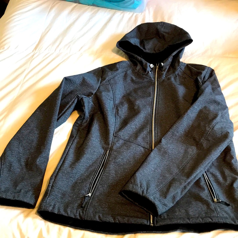 Very cute and comfy windbreaker! It is lined with very soft material! Like new!